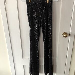 Forever 21 size exsmall  black sequinned pants, wide bell bottoms, elastic waist